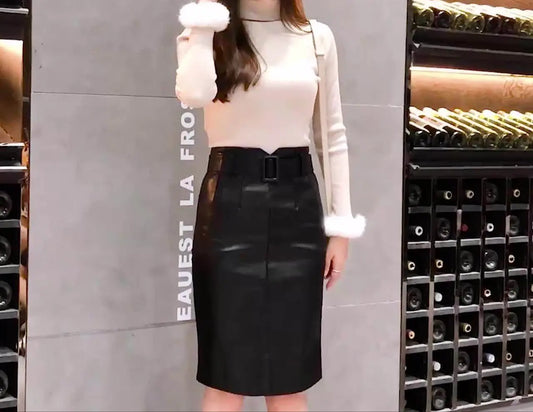 Jupe noire en cuir végan pour femmes, style tempérament commute, avec fermeture éclair et couture décorative.