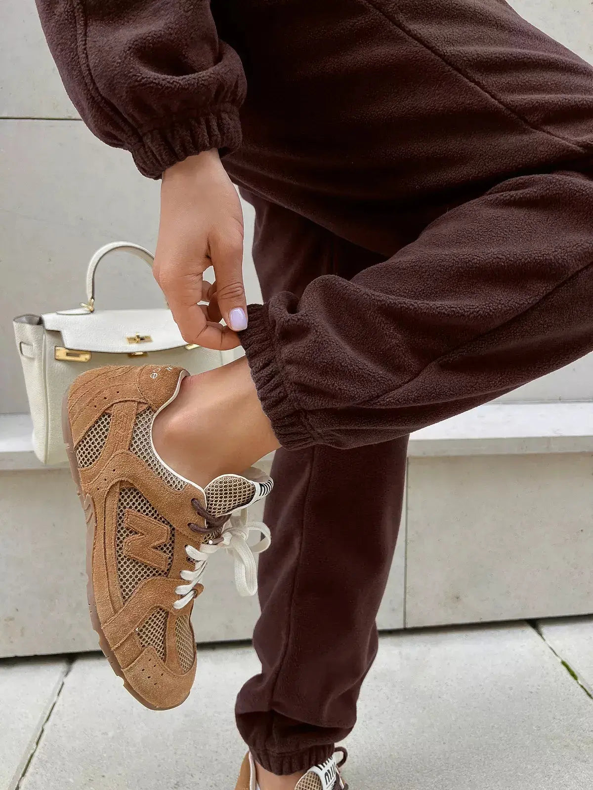 Détail du pantalon de la combinaison femme marron SecretBombe