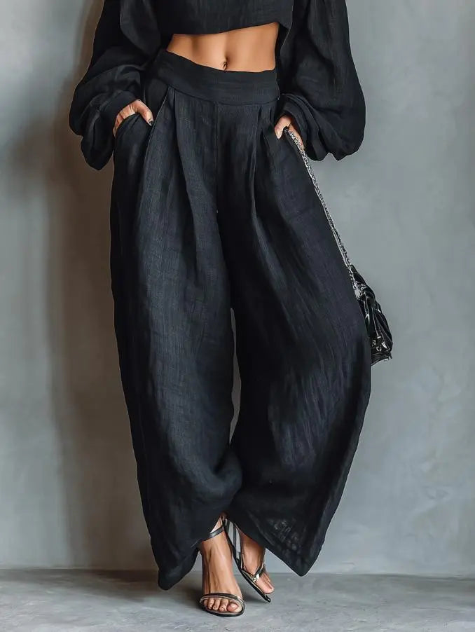 Ensemble femme noir avec manches bouffantes et pantalon large pour un look chic SecretBombe