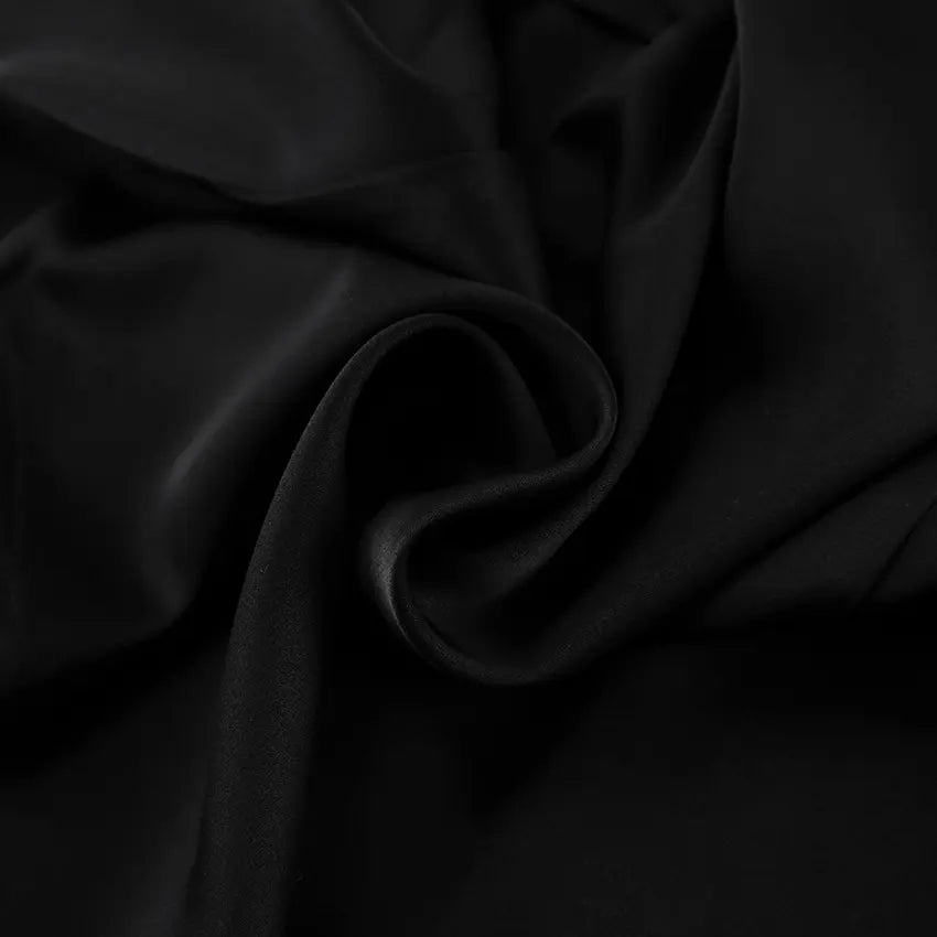 Ensemble tailleur femme noir avec blazer élégant et pantalon ample SecretBombe