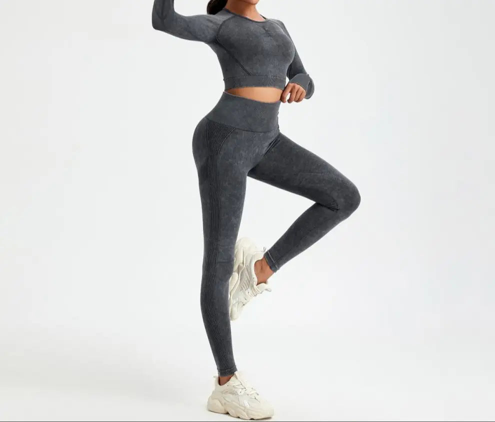 Legging de sport gris vue de face, tissu sculptant et respirant