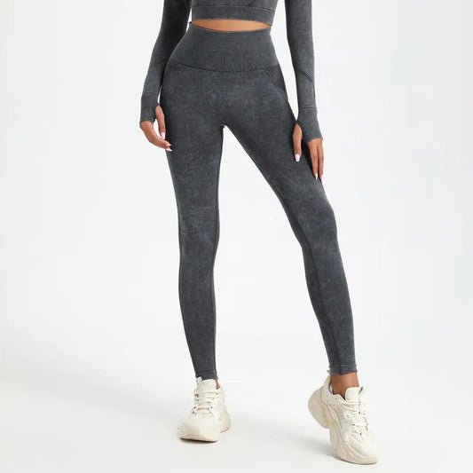 Legging gris de sport vue de profil, coupe ajustée et confortable