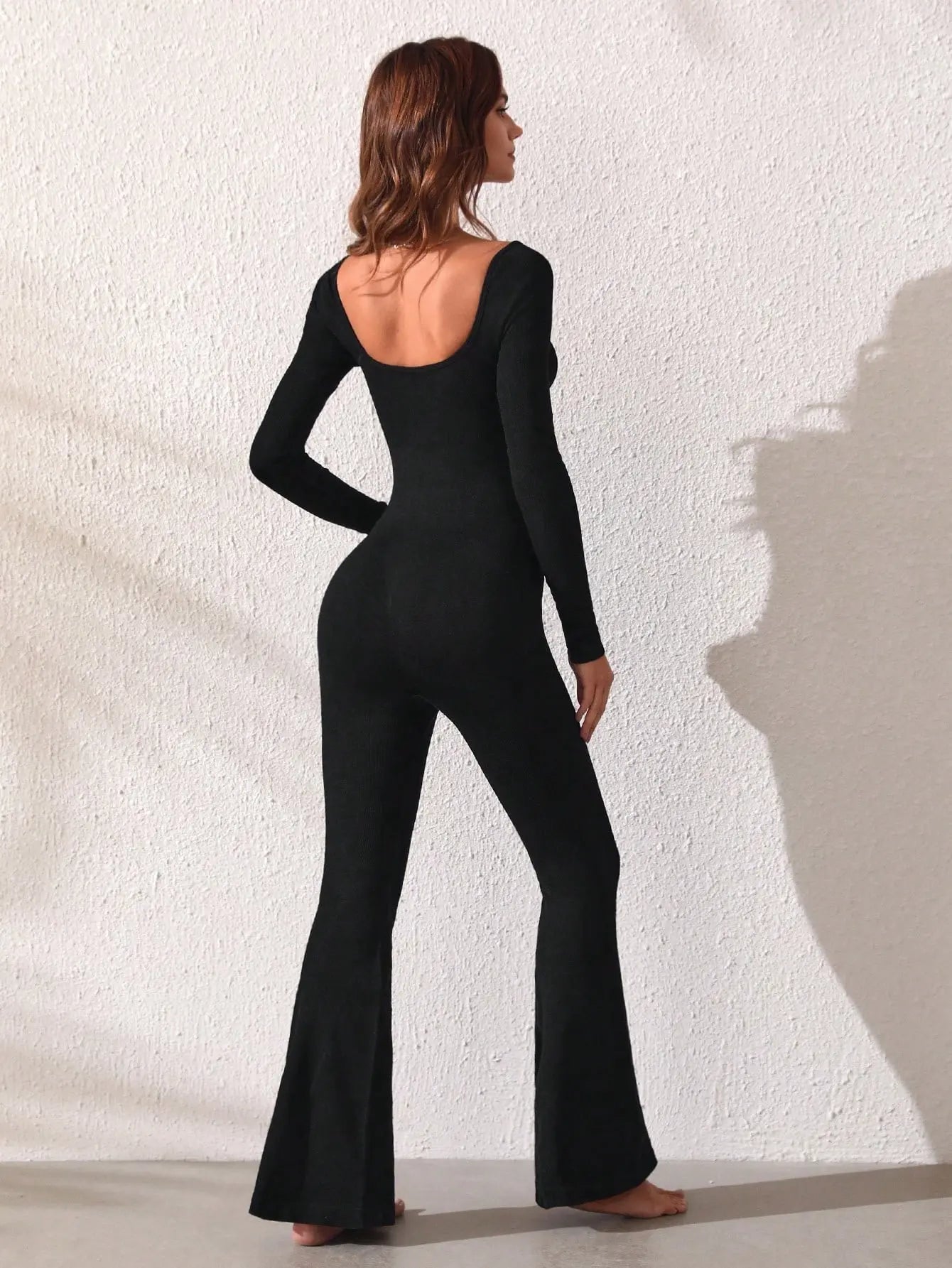 Combinaison pantalon noire bas évasé femme SecretBombe chic