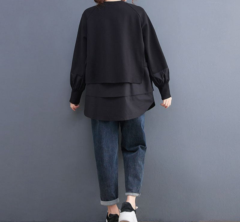 Sweat bicolore oversize noir et taupe, style urbain moderne, coupe loose ample, manches longues, look original
