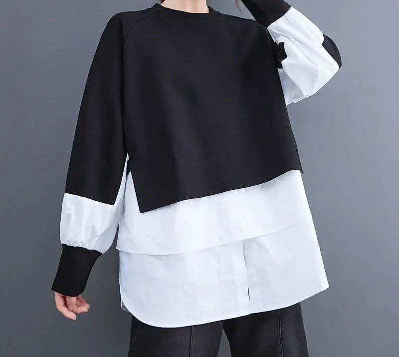 Sweat bicolore oversize noir et taupe, style urbain moderne, coupe loose ample, manches longues, look original