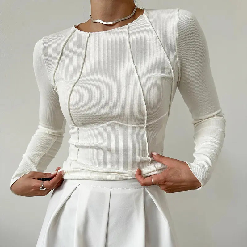 Top femme blanc manches longues chic et ajusté