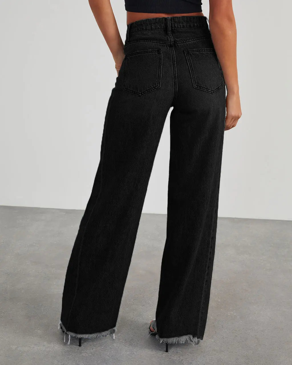 Vue dos du jean noir femme à jambes larges SecretBombe
