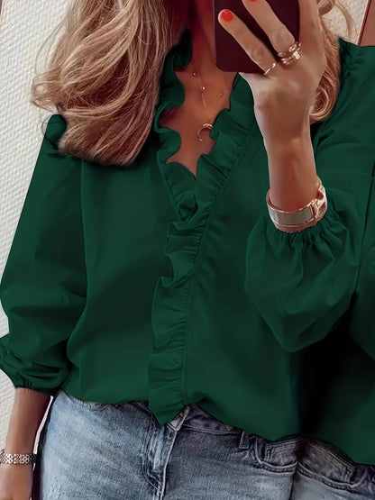 Blouse femme fluide, manches longues à poignets élastiqués, volants délicats sur le col V et le buste, élégante et moderne, coloris variés, tailles S à 2XL.