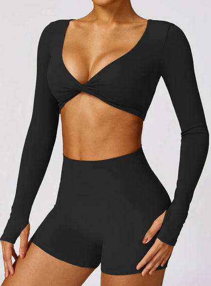Top de sport noir croisé torsadé, vue de dos, coupe ajustée et tendance