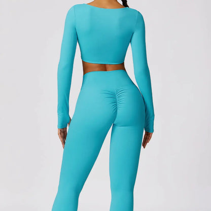 Top de sport bleu croisé en forme papillon, manches longues avec trous pour pouces