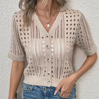 un cardigan ajouré à manches mi-longues, coupe courte, 