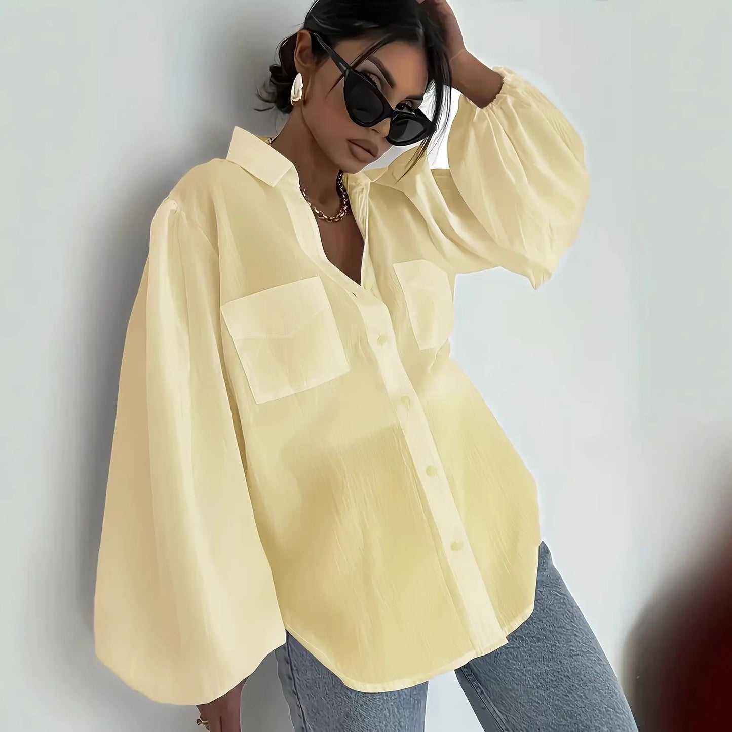 Chemise femme à manches bouffantes disponible en noir, bleu, rose, blanc et jaune clair - SecretBombe.