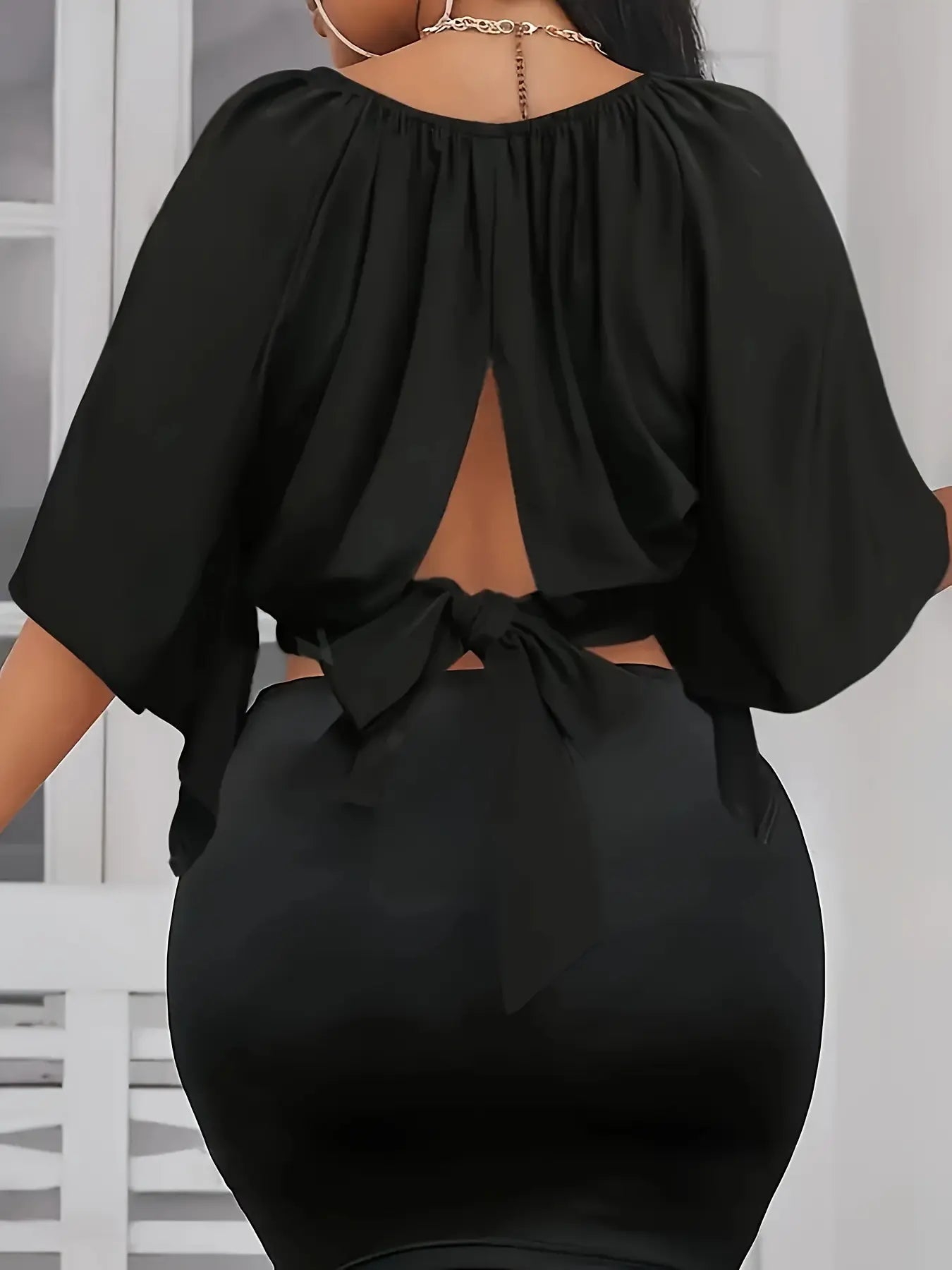 Chemisier femme vue de dos coupe ample manches pétale - SecretBombe