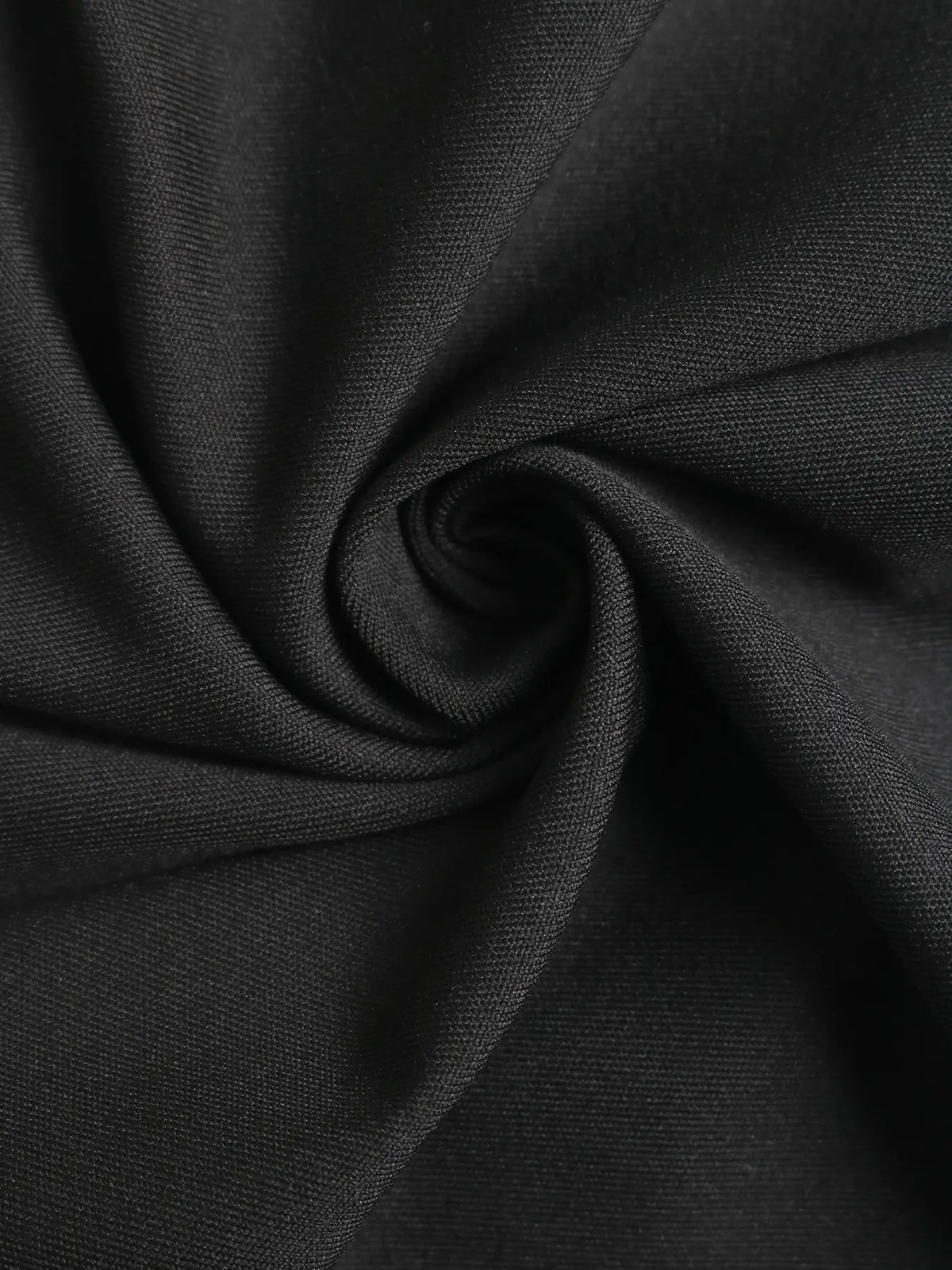 Combinaison femme noire élégante avec ceinture et pantalon fluide SecretBombe