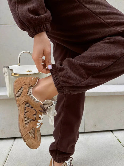 Détail du pantalon de la combinaison femme marron SecretBombe