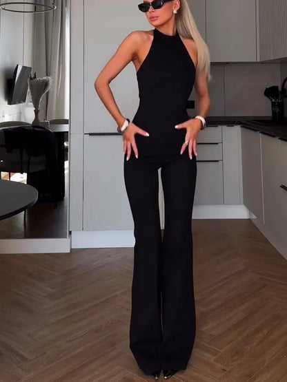 Combinaison dos nu noire femme, pantalon long légèrement évasé