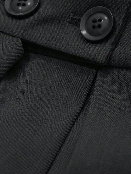 Détail des boutons à la taille du pantalon noir femme SecretBombe