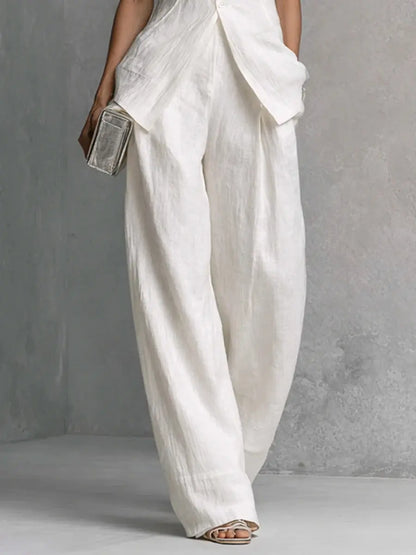 Détail du pantalon large blanc de l'ensemble femme SecretBombe