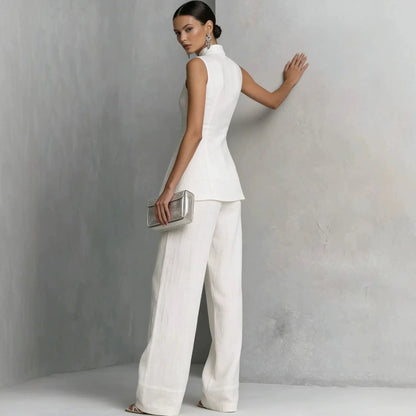 Vue arrière de l'ensemble femme blanc avec haut structuré et pantalon large SecretBombe