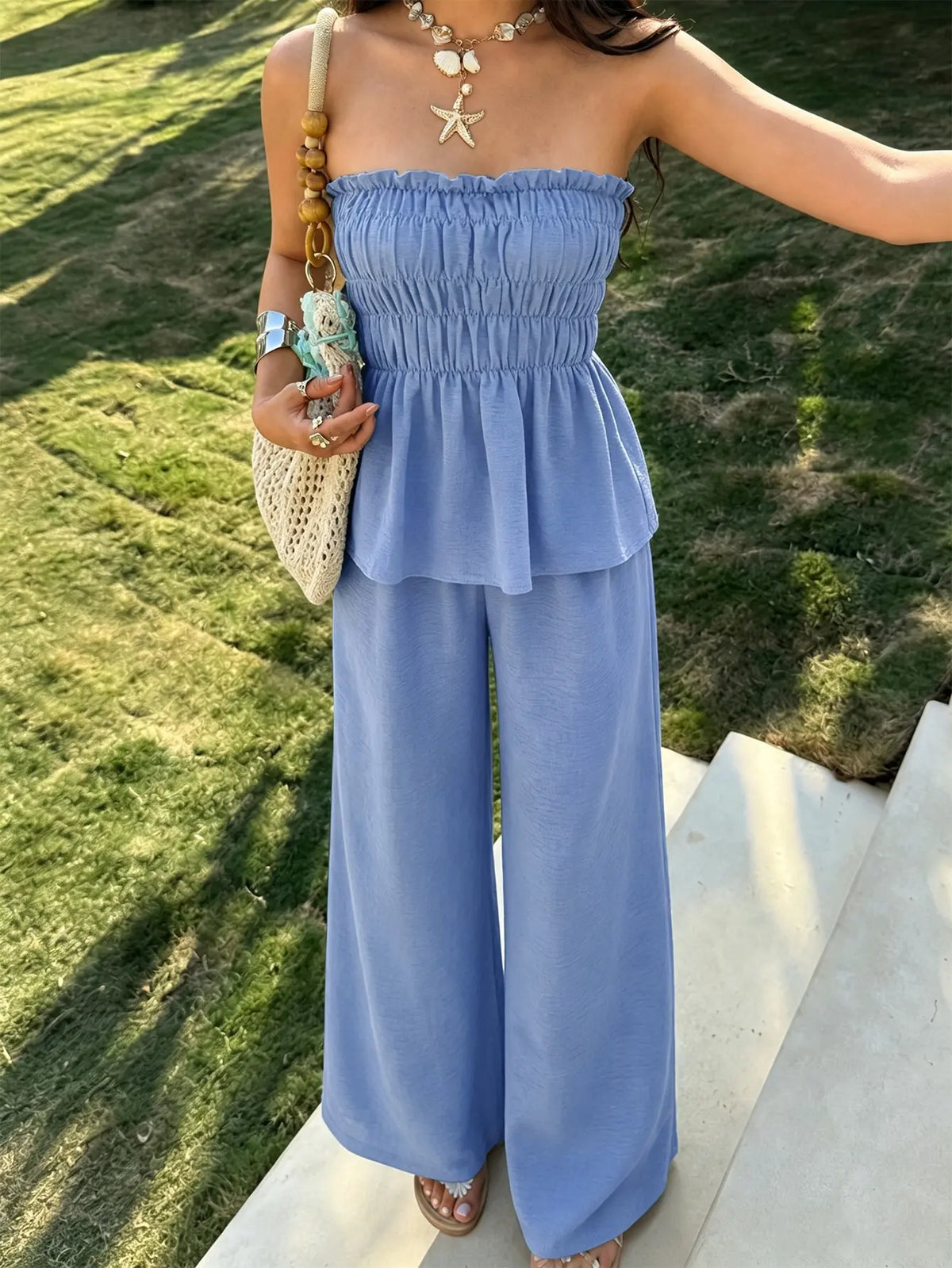Ensemble deux pièces femme bleu clair avec haut bustier et pantalon ample SecretBombe