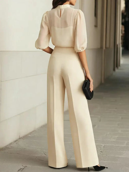 Vue arrière de l'ensemble femme écru avec haut à manches bouffantes et pantalon large SecretBombe