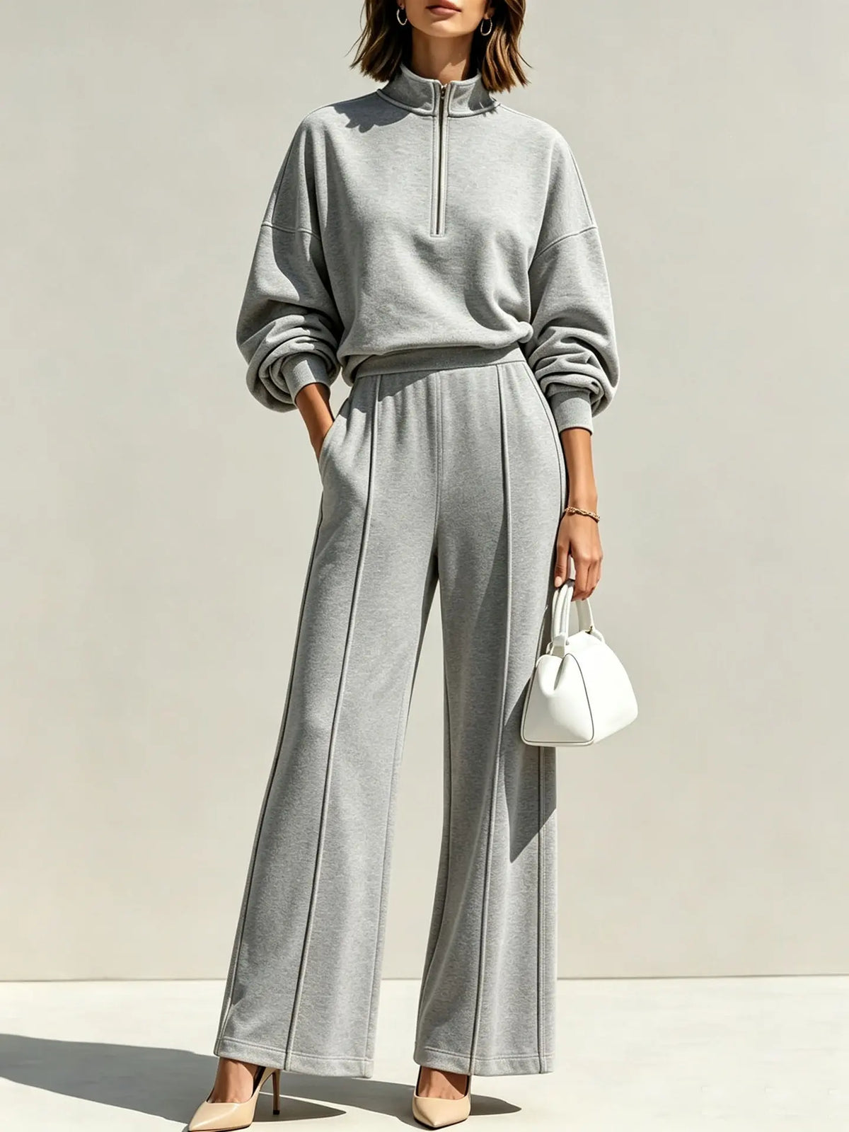 Ensemble femme gris deux pièces avec sweat à col montant zippé et pantalon large SecretBombe