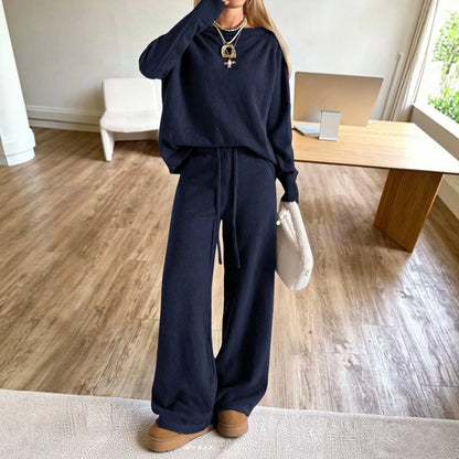 Ensemble femme bleu marine avec haut à épaules dénudées et pantalon large SecretBombe