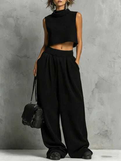 Ensemble femme noir avec haut court à col montant et pantalon large SecretBombe