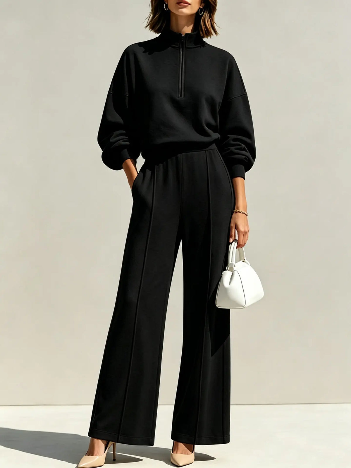 Ensemble femme noir avec sweat à demi-zip et pantalon large SecretBombe