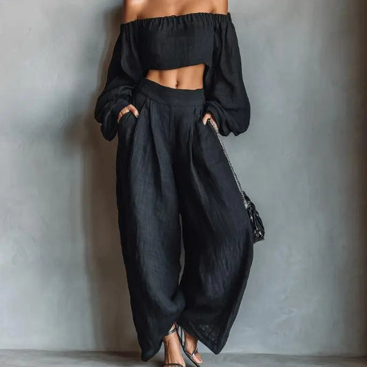 Ensemble femme noir deux pièces avec haut court à épaules dénudées et pantalon large SecretBombe