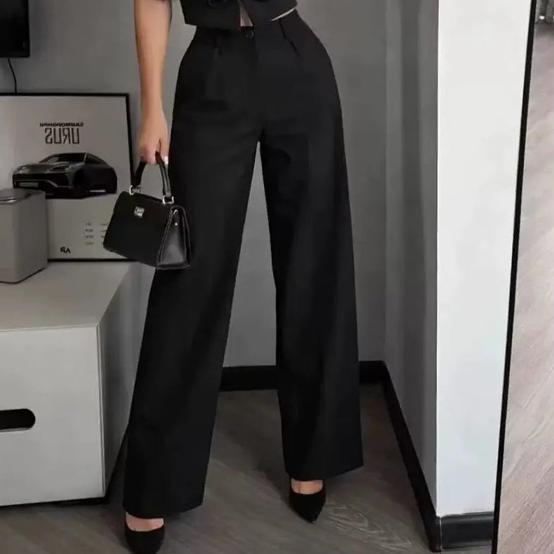 Ensemble deux pièces femme noir avec gilet cintré sans manches et pantalon large taille haute SecretBombe