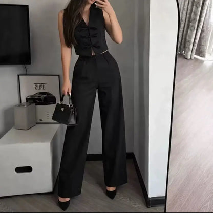 Ensemble deux pièces femme noir avec gilet cintré sans manches et pantalon large taille haute SecretBombe