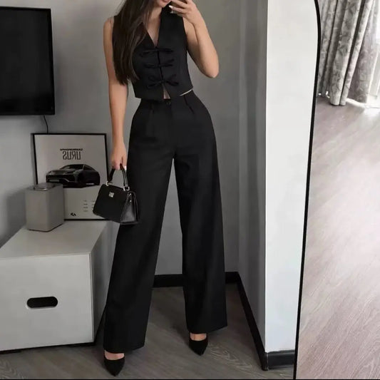 Ensemble deux pièces femme noir avec gilet cintré sans manches et pantalon large taille haute SecretBombe