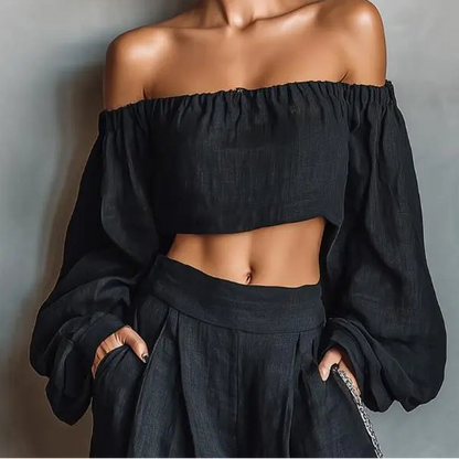 Vue rapprochée de l'ensemble femme noir avec haut court et manches longues bouffantes SecretBombe