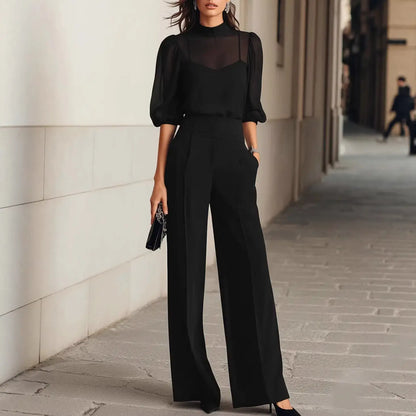Ensemble femme noir avec haut à empiècement transparent et pantalon large SecretBombe