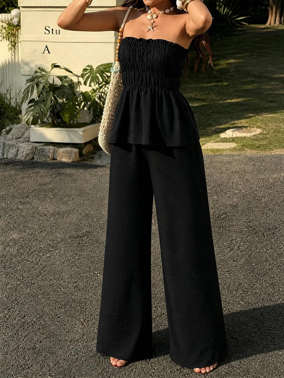 Ensemble femme noir avec bustier sans manches et pantalon ample SecretBombe