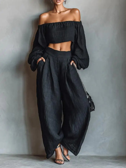 Ensemble deux pièces femme noir avec pantalon ample et haut à épaules dénudées SecretBombe