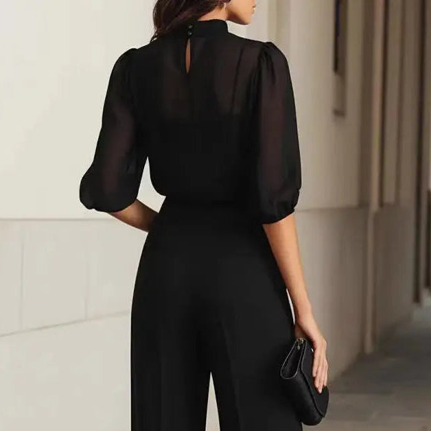 Vue arrière de l'ensemble femme noir avec haut transparent et pantalon large SecretBombe