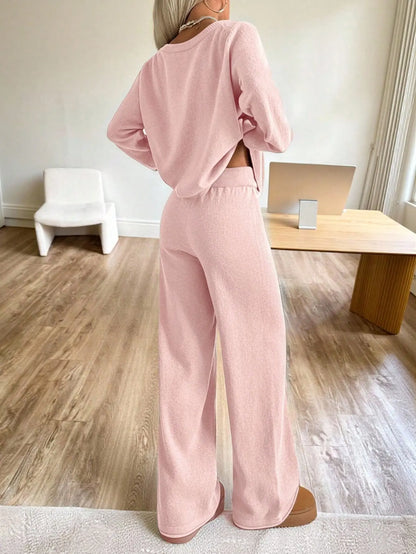 Vue arrière de l'ensemble femme rose avec pantalon large SecretBombe
