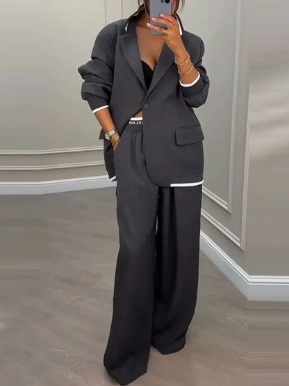 Ensemble femme gris anthracite avec blazer et pantalon large taille haute SecretBombe