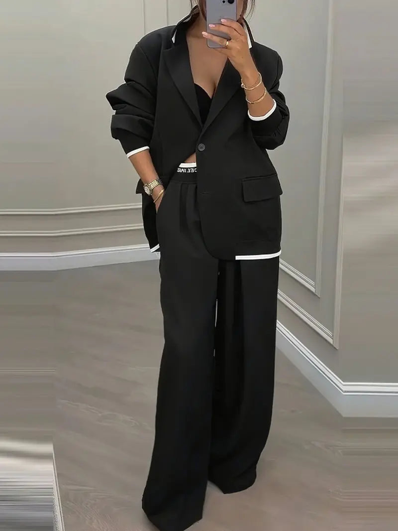 Tailleur pantalon femme noir avec blazer élégant et pantalon ample SecretBombe