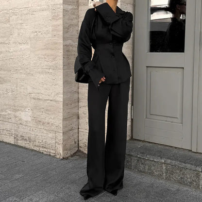 Ensemble tailleur femme noir avec blazer cintré et pantalon large SecretBombe