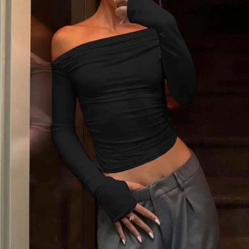 Haut noir femme slim fit avec effet plissé moderne – SecretBombe