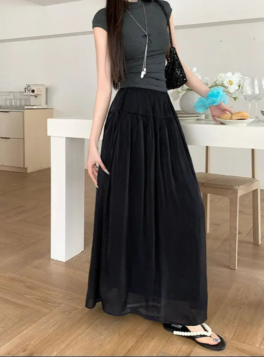 Jupe longue streetwear noire fluide et élégante pour femme
