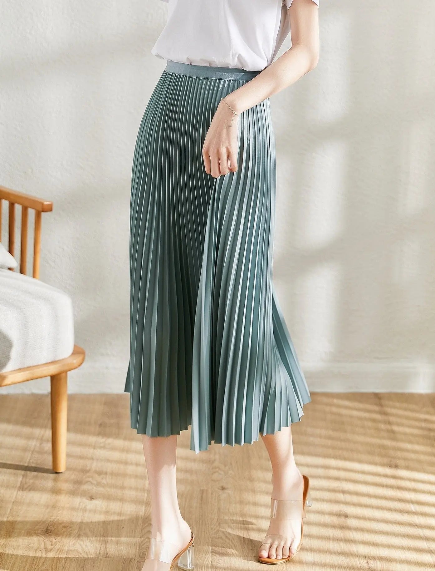 Jupe mi-longue plissée en voile léger, féminine et tendance
