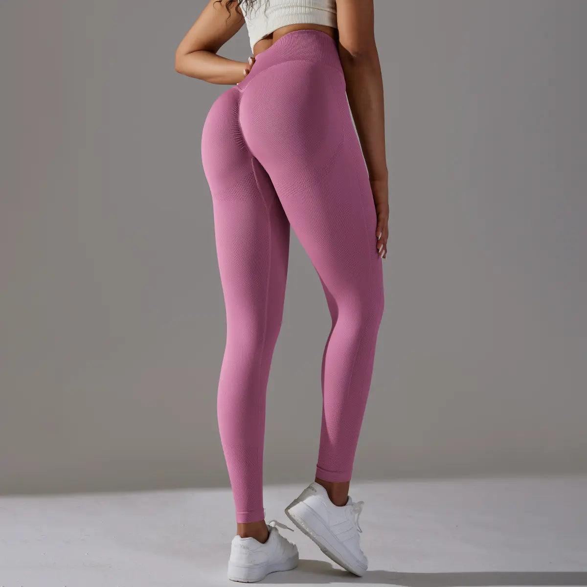 Mannequin portant le legging de fitness, coupe ajustée et ceinture amincissante