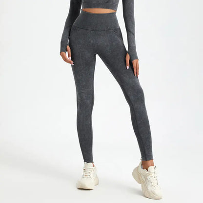 Legging gris de sport vue de profil, coupe ajustée et confortable