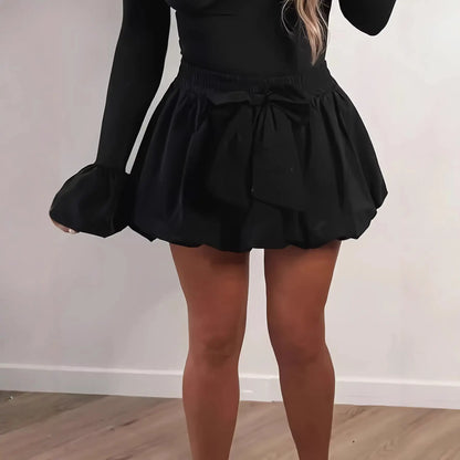Mini-jupe bouffante noire femme SecretBombe avec nœud à la taille, coupe courte élégante