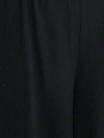 Pantalon femme noir à coupe carotte et détails en dentelle SecretBombe