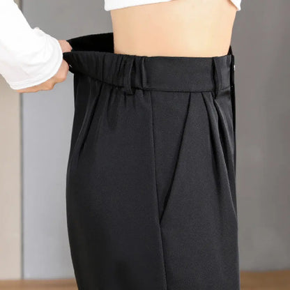 Pantalon femme noir élégant avec pinces à l’avant